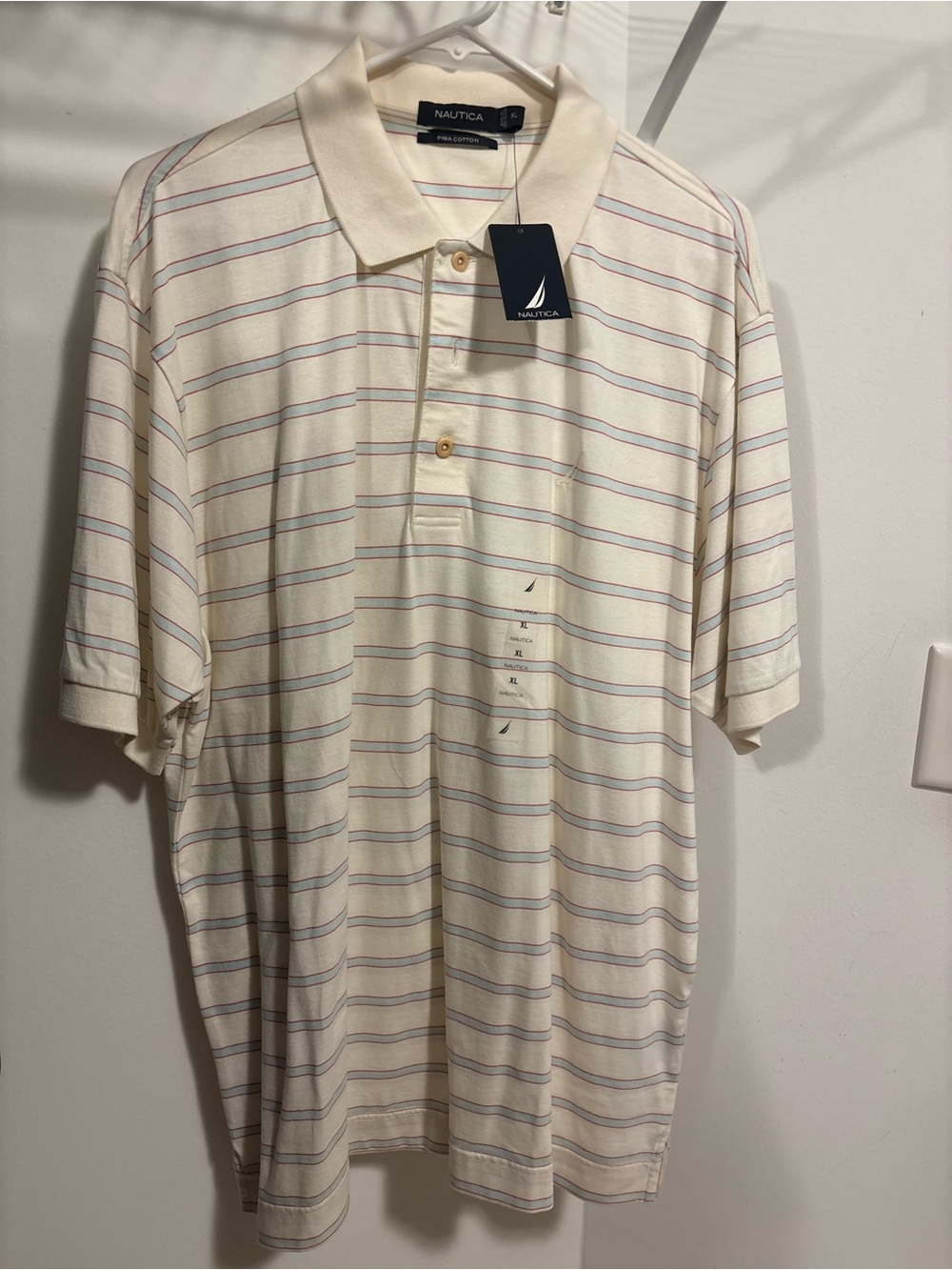 Nautica Men’s Cream Polo with Subtle Multi-Stripe